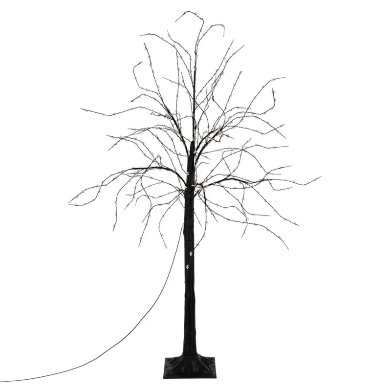 Dünner, beleuchteter Baum ohne Blätter auf einem Sockel.