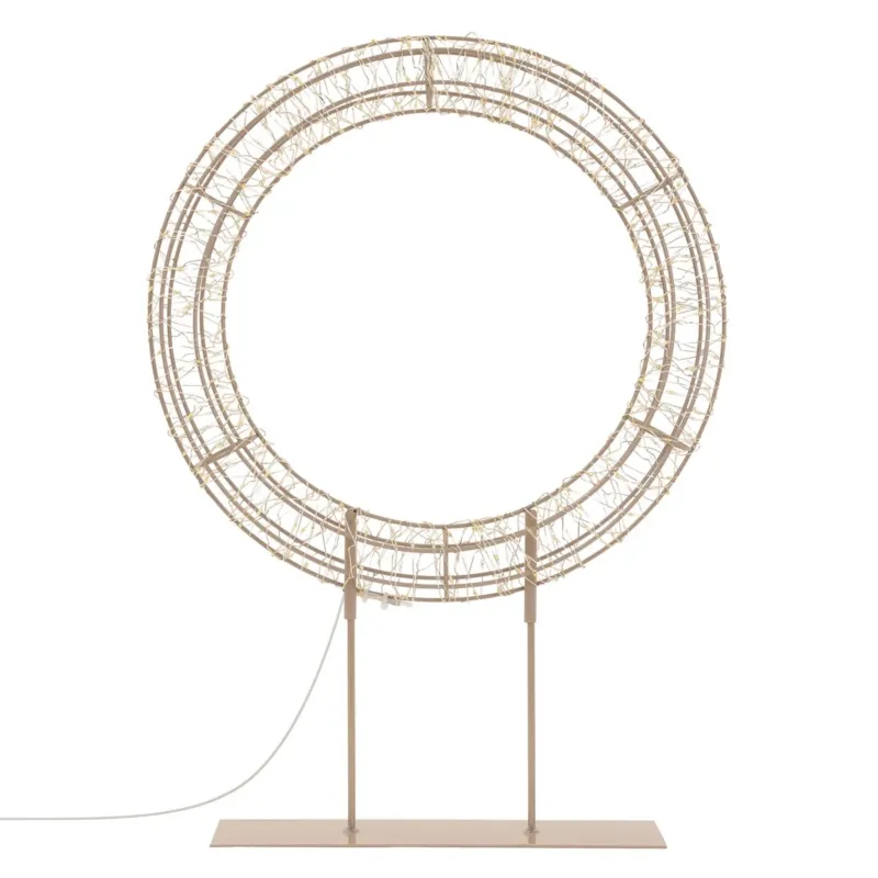 Stehlampe in runder Form mit einem Drahtgestell auf einem stabilen Sockel.