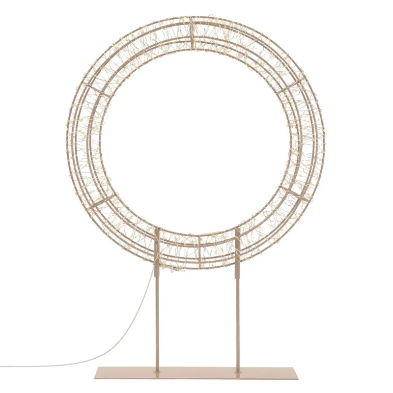 Stehlampe in runder Form mit einem Drahtgestell auf einem stabilen Sockel.