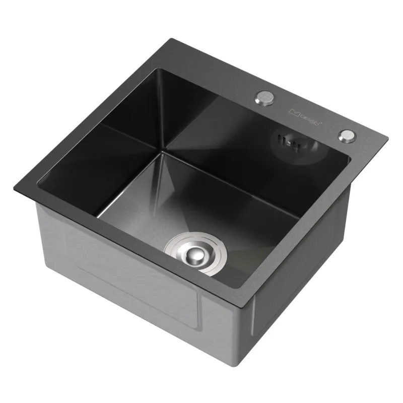 Schwarzes Spülbecken mit Abfluss und zwei Bedienelementen.