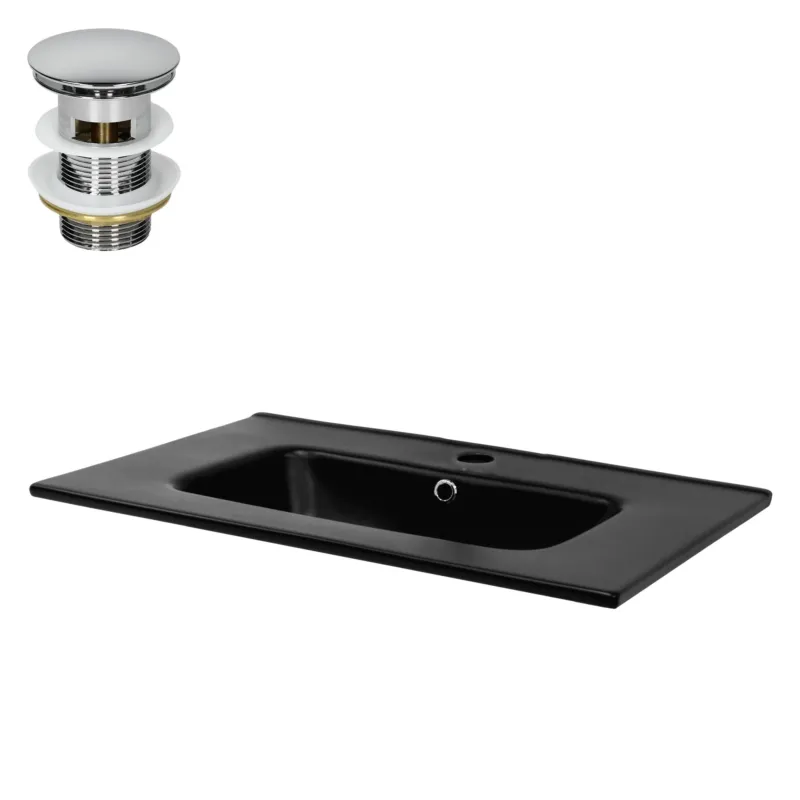 Schwarzes Waschbecken mit Abfluss und Überlauf.