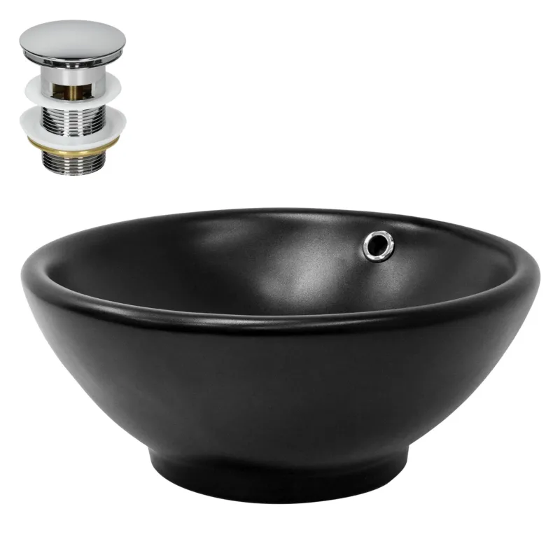 Schwarzes, rundes Waschbecken mit Abfluss und Wasserhahn.